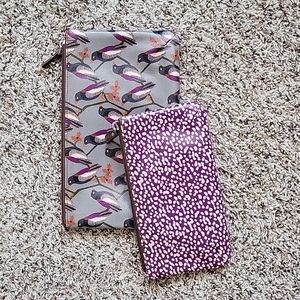 Two Fossil makeup bags